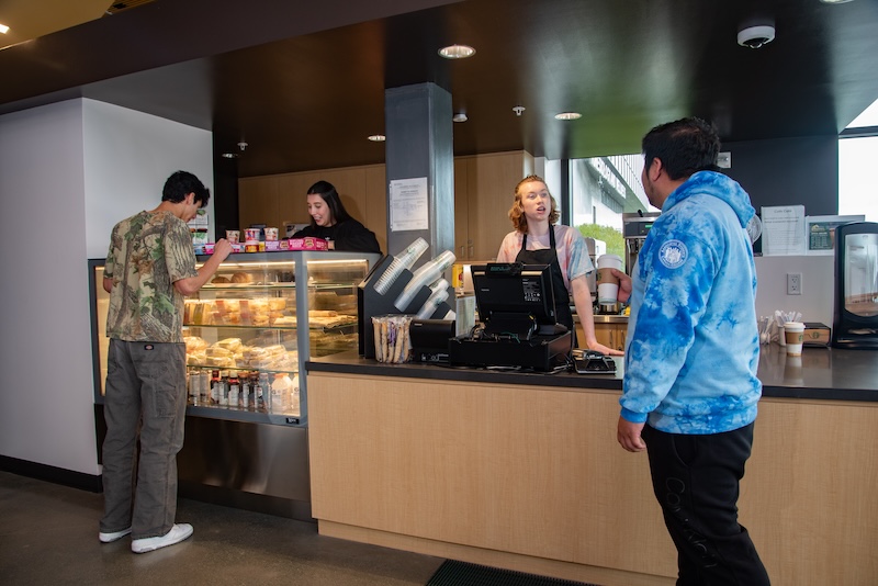 Students ordering food and drinks at the Colts Café