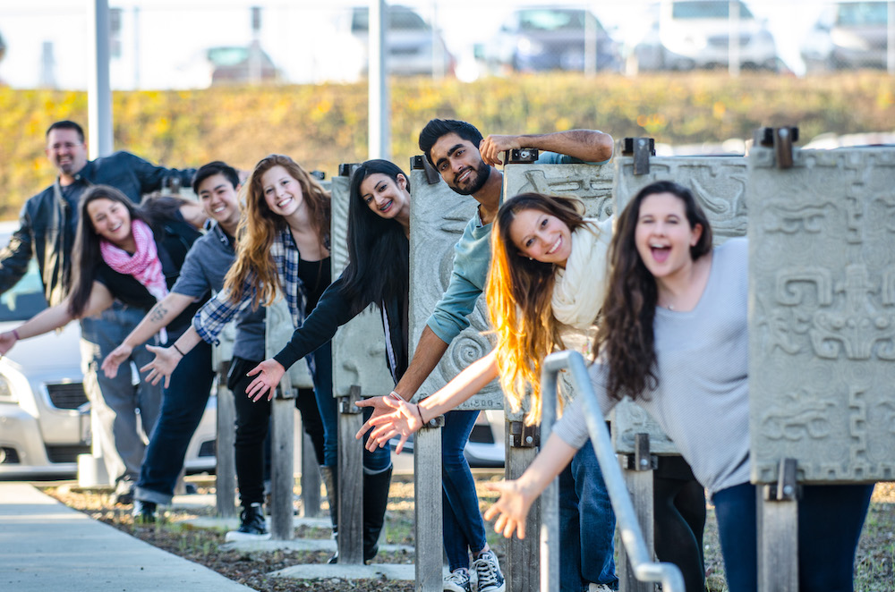 Photo of students smiling.